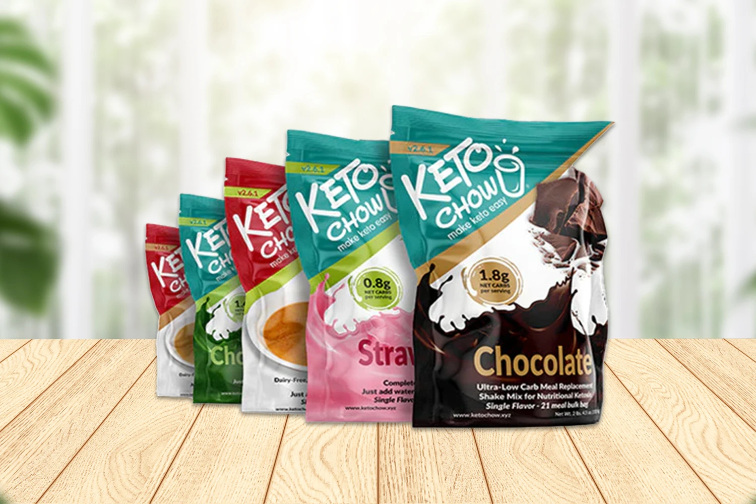 Keto chow keto meal replacement shakes on wooden background.