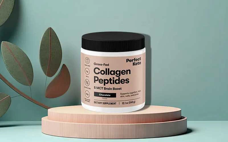 Perfect Keto Grass-Fed Collagen Peptides on leafy background.