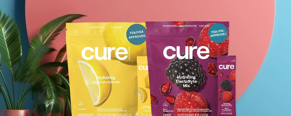 different flavors of Cure hydration electrolyte mix on leafy background