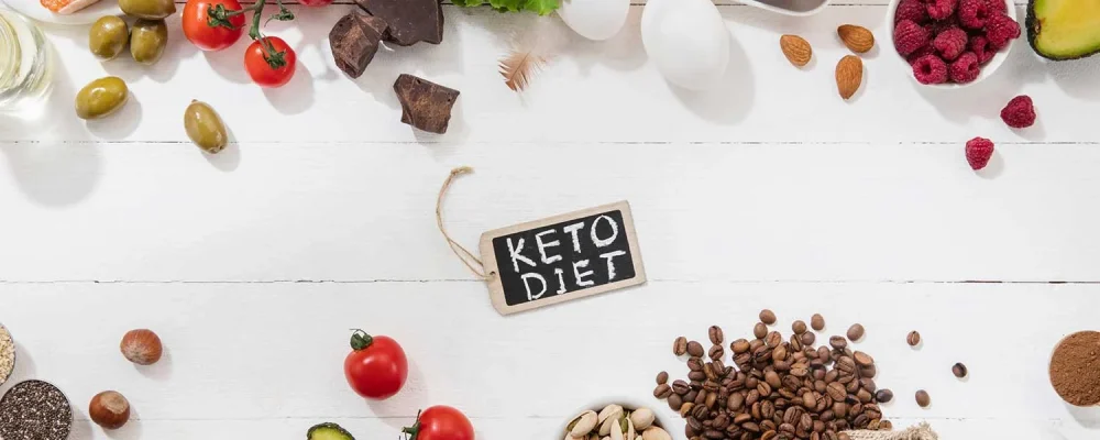 Ketogenic low carbs diet - food selection on white background. Balanced healthy organic ingredients of high content of fats for the heart and blood vessels. Meat, fish and vegetables