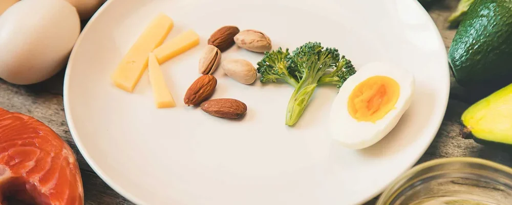 High-protein keto diet foods on a plate.