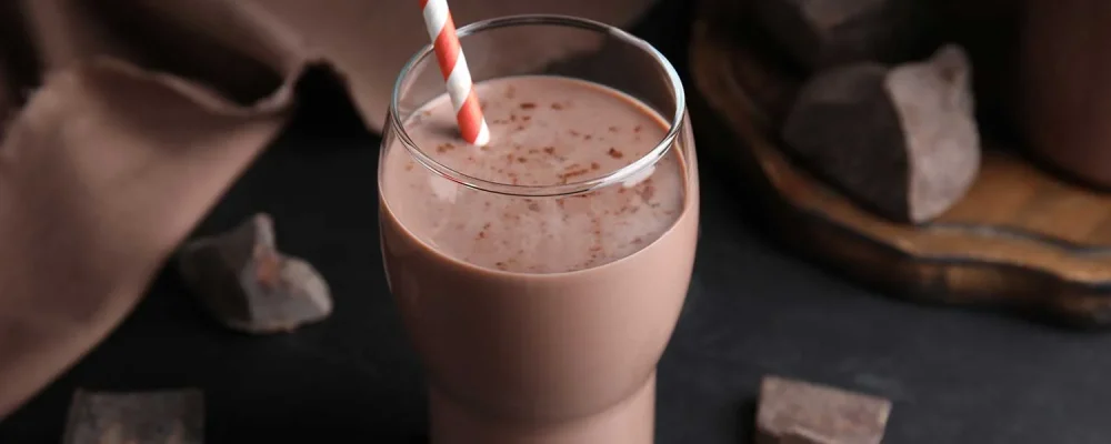 Delicious Keto Shake in glass on black table